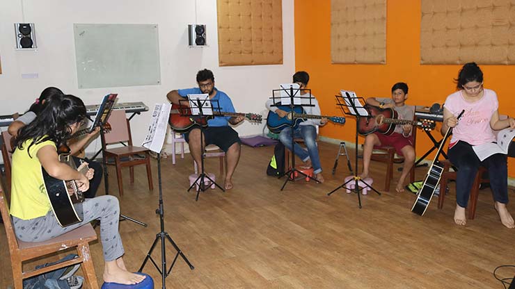 guitar Ajivasan Music and Dance Academy